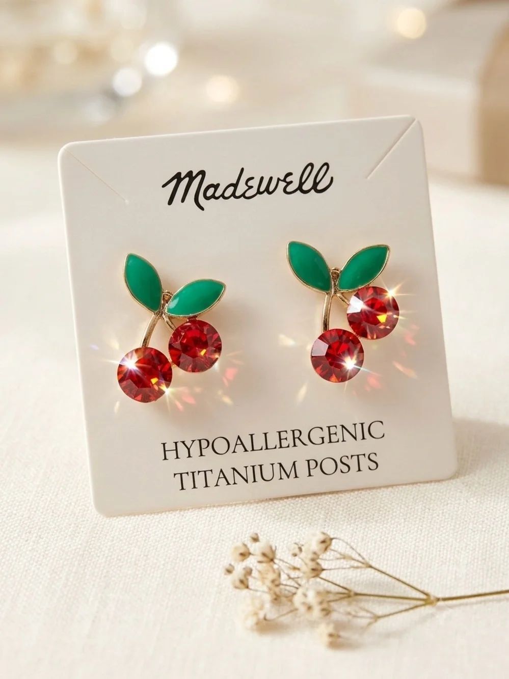 Madewell cherry drop earrings.